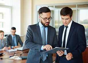 employees discussing in an office