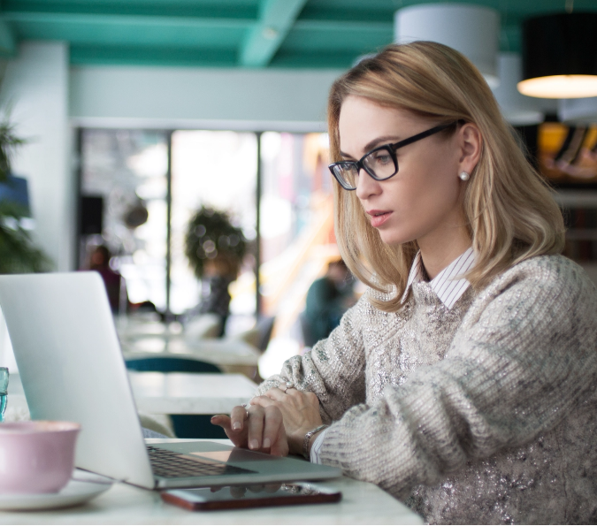 a girl working on a laptop